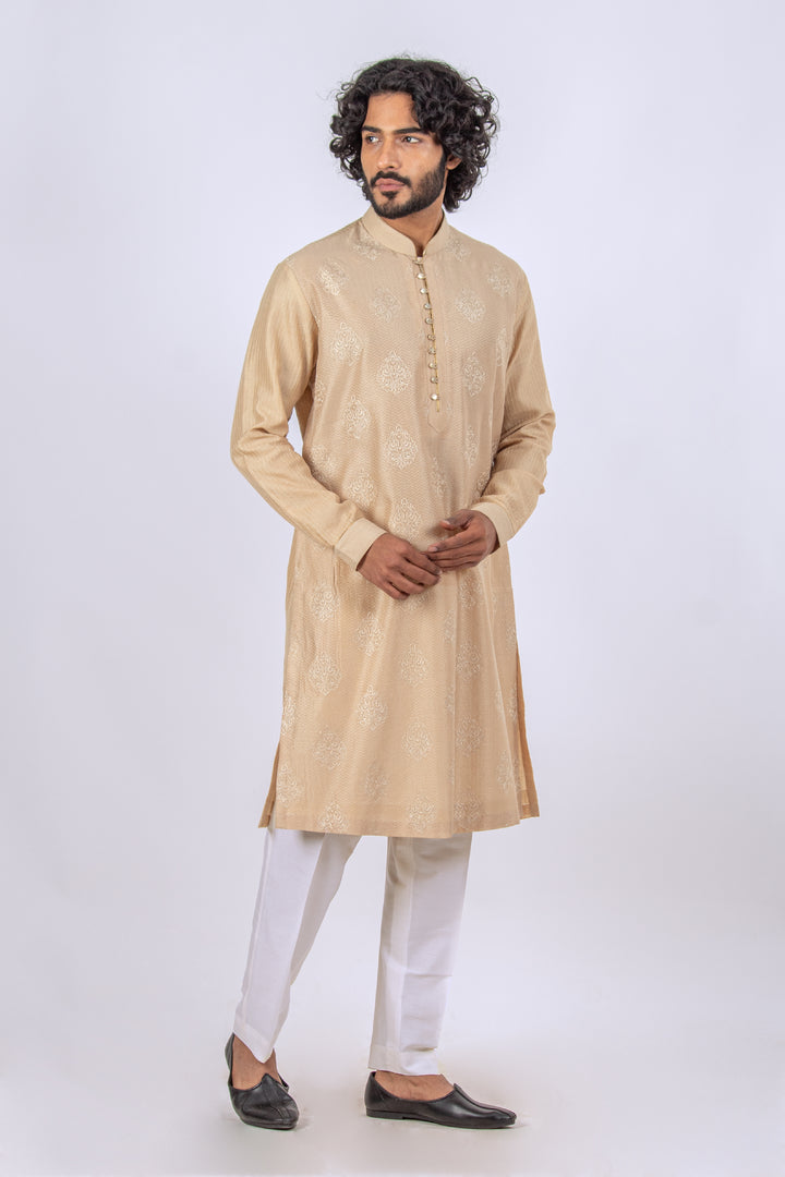 BEIGE ALLOVER MACHINE EMBROIDERY KURTA (only kurta)