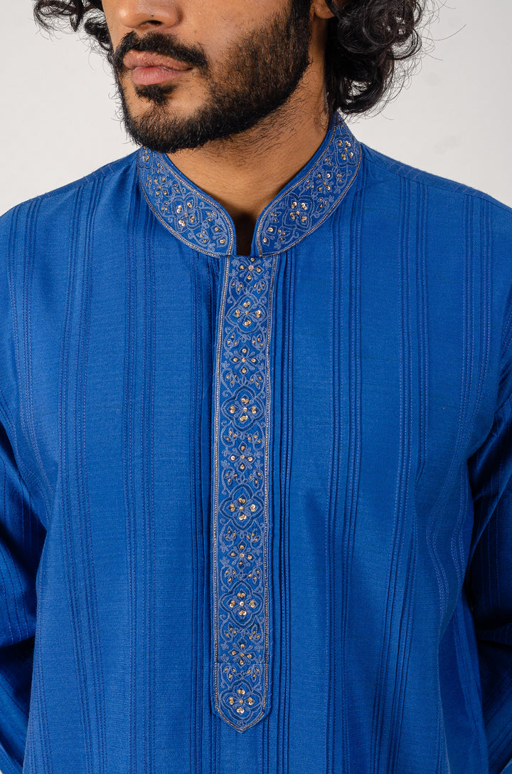 BLUE PANNEL PINTUCK WITH EMBROIDERED PLACKET KURTA (only kurta)